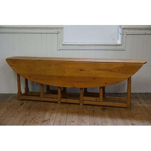 471 - An 18th Century design Irish Pine Wake Table with Fold-Out Bulbous Flaps & Square Cross Stretchers i... 