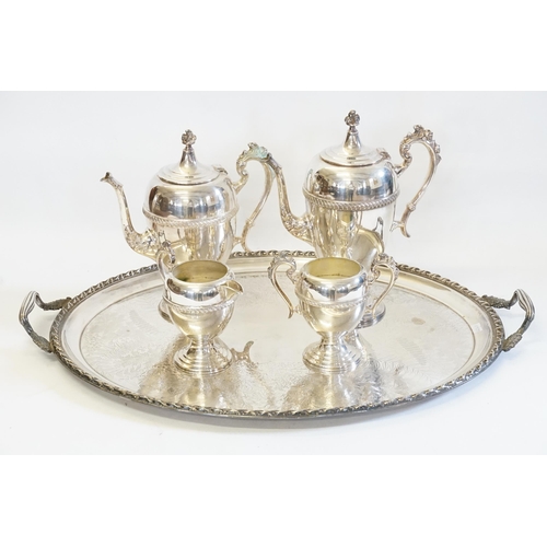 62 - An America designed Four Piece Siler Plated Tea Set along with a Victorian Silver Plated Fern engrav... 