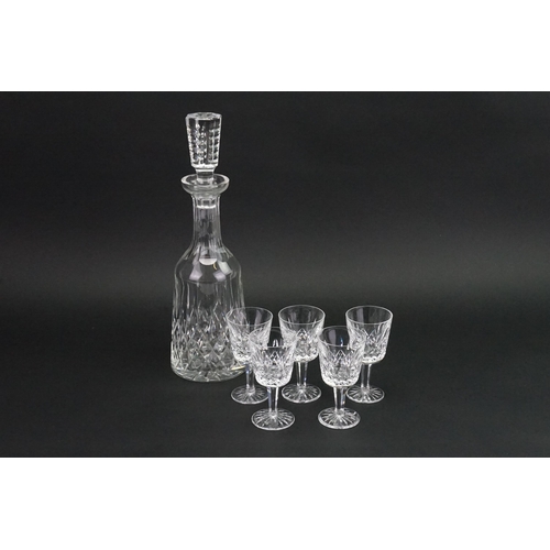 546 - A Waterford cut glass decanter along with five Waterford glasses.