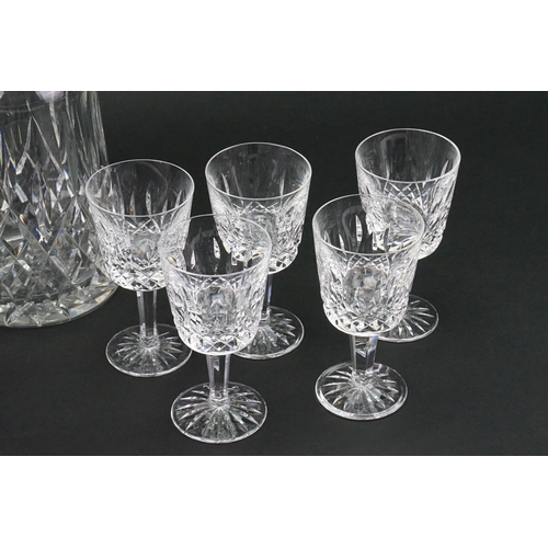 546 - A Waterford cut glass decanter along with five Waterford glasses.