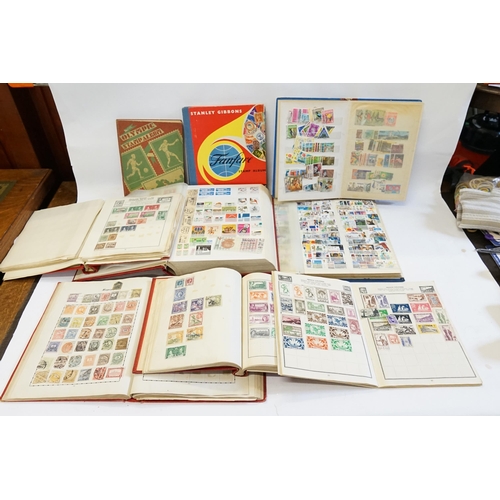 229 - A World Collection of Nine Stock Books & Stamp Albums. Many Early European Stamps noted. Also includ... 