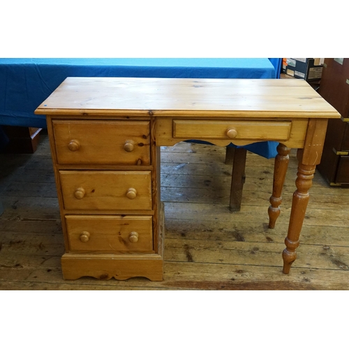 517 - A Pine Three Drawers Dressing Table/Desk. Measuring: 102cms across x 43cms deep x 75cms high.