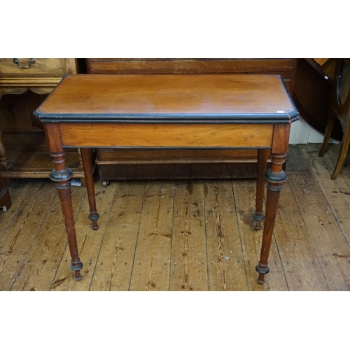 507 - A Stained Oak Fold-Over Top Tea Table. Measuring: 91cms across x 45cms deep x 79cms high. (Closed).