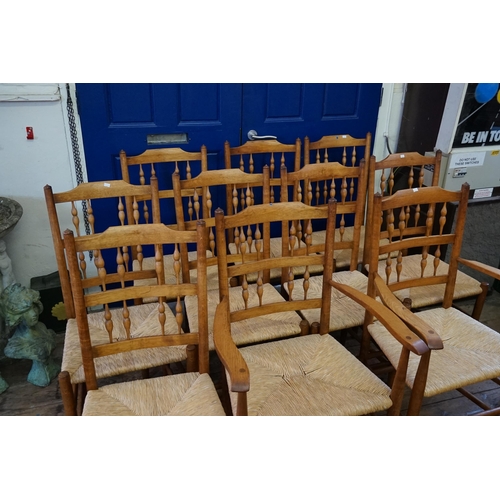 513 - A Set of 8 + 2 Pine & Wicker Seated Kitchen Chairs to include Two Carvers & Eight Chairs.