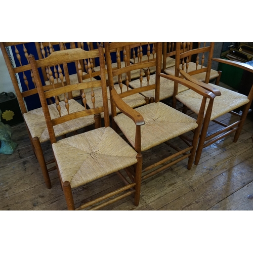 513 - A Set of 8 + 2 Pine & Wicker Seated Kitchen Chairs to include Two Carvers & Eight Chairs.