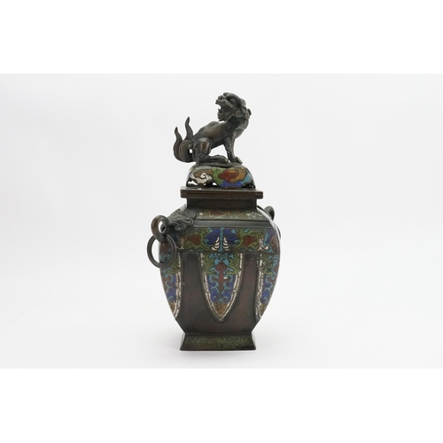 392 - A antique green blue and red enamelled bronze vase, depicting a dog of Fo. Height 30cm.