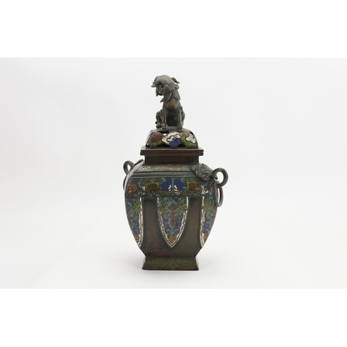 392 - A antique green blue and red enamelled bronze vase, depicting a dog of Fo. Height 30cm.