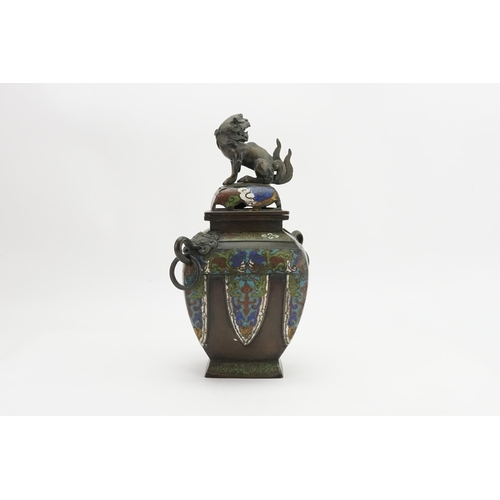 392 - A antique green blue and red enamelled bronze vase, depicting a dog of Fo. Height 30cm.