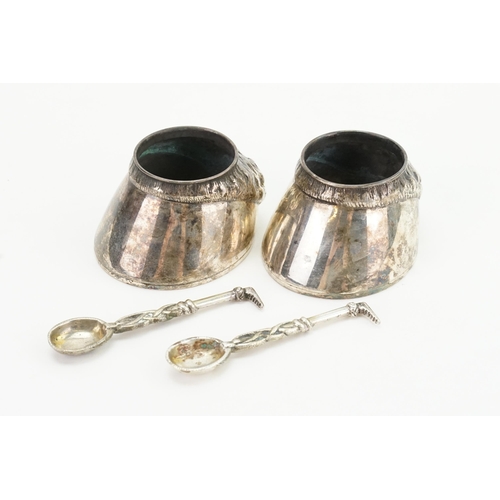 53 - A pair of 1877 Silver horse hoof salts, with matching spoons made by Edward H Stockwell. Weight: 148... 