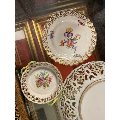 327 - Two Meissen design pierced and gilt fruit baskets along with two Dresden sweet baskets and saucer di... 