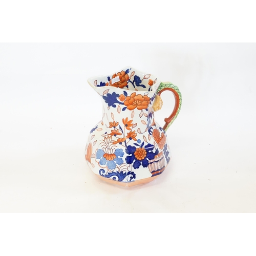 1009 - An Ironstone Rust & Blue Floral decorated Toilet Jug.