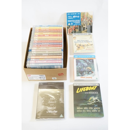 575 - A collection of Eureka! sealed DVDs, along with one steel back life boat. To include metropolis, sta... 