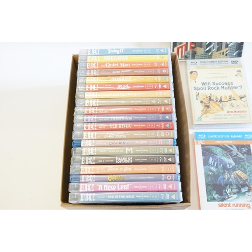 575 - A collection of Eureka! sealed DVDs, along with one steel back life boat. To include metropolis, sta... 