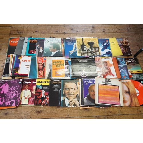 587 - A quantity of LP Records to include Johnny Mathis, Neil Diamond, Trini Lopez, Elton John, Gerry & th... 