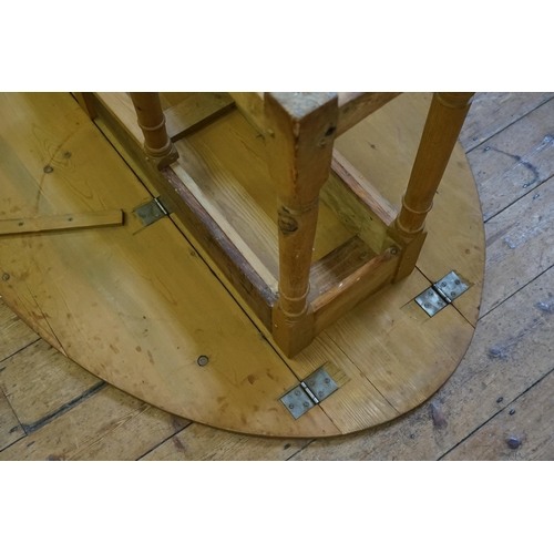 688 - An Irish Pine Wake Table with Fold-Out Bulbous Flaps & Square Cross Stretchers in the Irish Taste. M... 