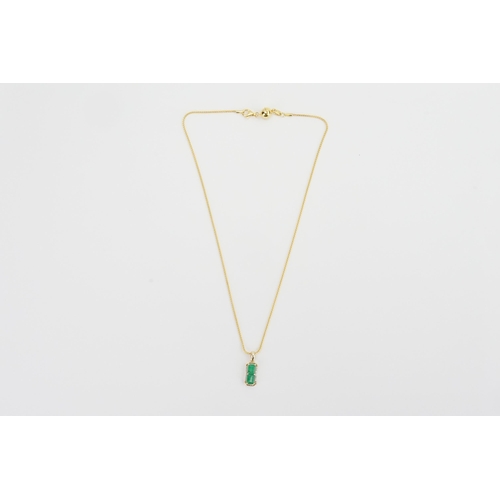 283 - A 9ct gold pendant with two approx 0.9ct emeralds, with diamond surrounds. Hung on a silver gilt pen... 