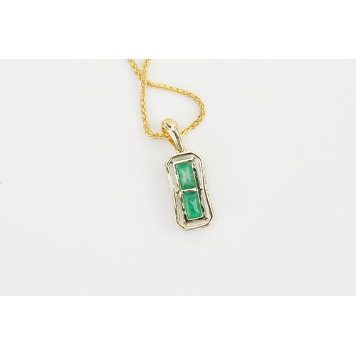 283 - A 9ct gold pendant with two approx 0.9ct emeralds, with diamond surrounds. Hung on a silver gilt pen... 