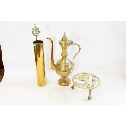 954 - A Turkish Brass Coffee Pot, a Shell Case & a Lion Trivet Stand, etc.