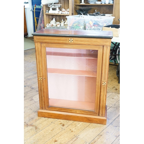 691 - A Voctorian Walnut veneered & line inlaid Pier Cabinet fitted with a Single glazed door. Measuring: ... 