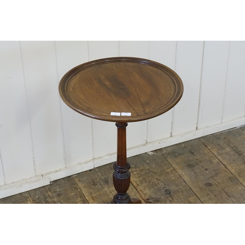 693 - A Walnut Wine Table.