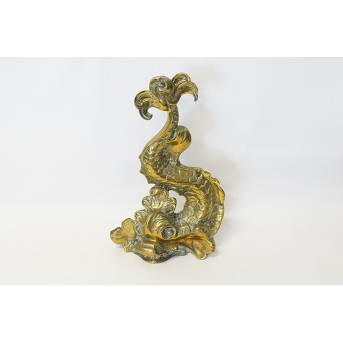 960 - A Regency Design Brass Dutch design Fish Door Stop. Measuring: 35cms High.