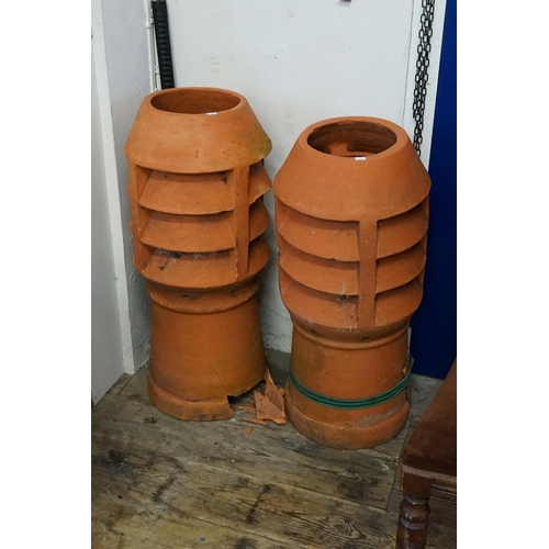 934 - A Large Pair of Terracotta Victorian Three Vented Chimney Pots. Measuring: 82cms high x 31cms across... 