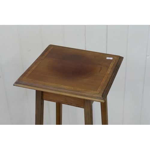 646 - An Edwardian Satin Wood inlaid Jardiniere Stand. Measuring: 28cms across x 30cms deep x 90cms high.