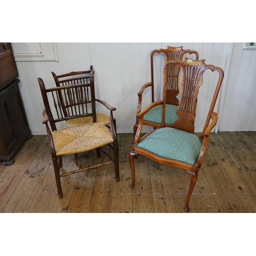 647 - A Pair of Victorian Holly inlaid Pierced Splatted Elbow Chairs with shaped seats & resting on pad fe... 