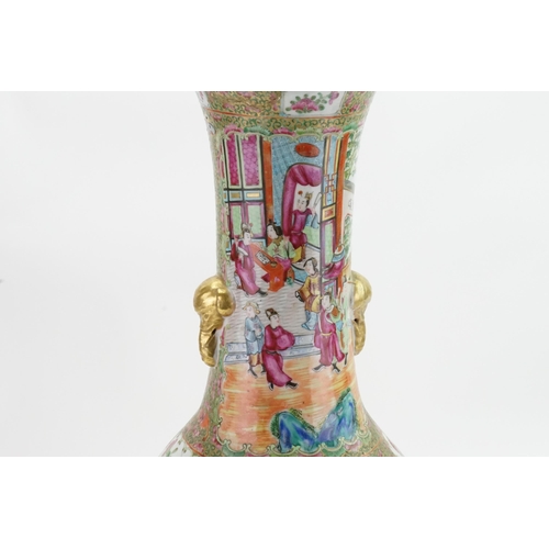 431 - A Chinese Cantonese enamelled Vase decorated with pavilions, Gardens, Cartouches of Summer Flowers, ... 