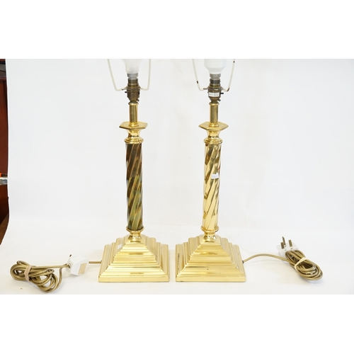 923 - A Pair of Brass Effect Turned Column Table Lamps with Silk Shades. Measuring: 84cms high. (Including... 