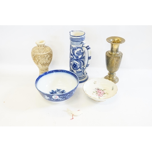 823 - A German Faience Pottery Jug, an Indian Brass Vase, Slop Bowl, etc.