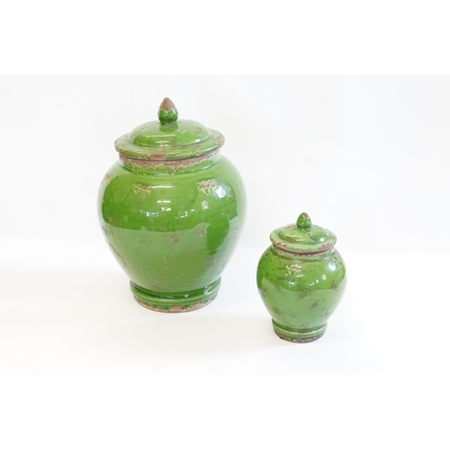 890 - A Pair of Chinese Green Glazed Storage Jars.