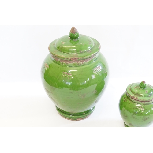 890 - A Pair of Chinese Green Glazed Storage Jars.