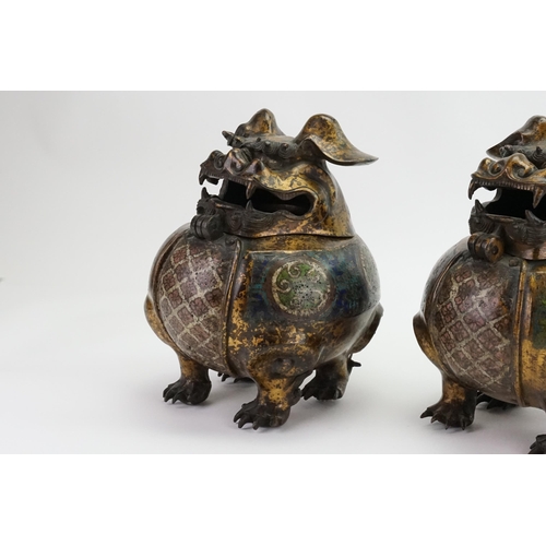 457 - A Pair of Japanese Cloisonne enamelled mythical Birds. 
Designed as Incense Burners in Squat Form & ... 