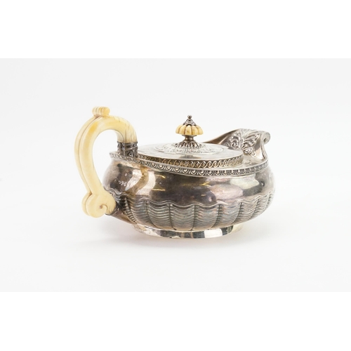 98 - An 1812 Classical design Squat Pattern Georgian Silver Tea Pot decorated with Egg & Rib Decoration, ... 