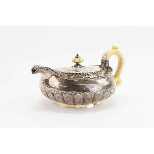 98 - An 1812 Classical design Squat Pattern Georgian Silver Tea Pot decorated with Egg & Rib Decoration, ... 