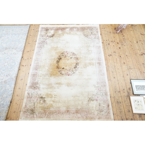 732 - A Chinese Washed Silk Effect Cream with a Pink Border, Greek Key patterned Carpet with a fringe edge... 