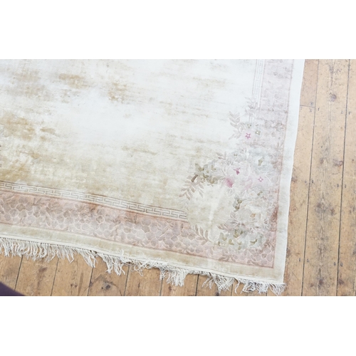 732 - A Chinese Washed Silk Effect Cream with a Pink Border, Greek Key patterned Carpet with a fringe edge... 