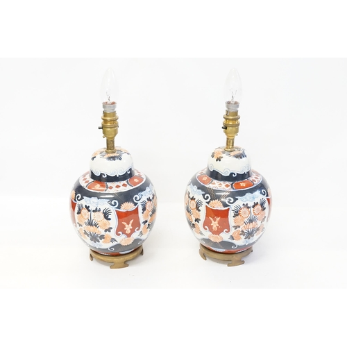 926 - A Pair of Japanese Imari Ginger Jars converted to Table Lamps. Measuring: 22cms high.