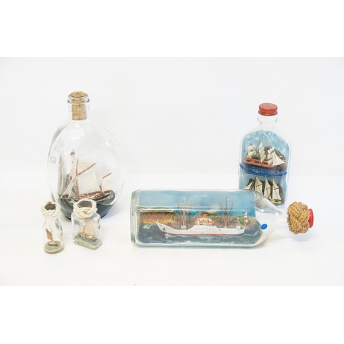 996 - A Collection of Five Vintage Ship's in Bottles to include Smacks, Clippers & Sailing Boats.