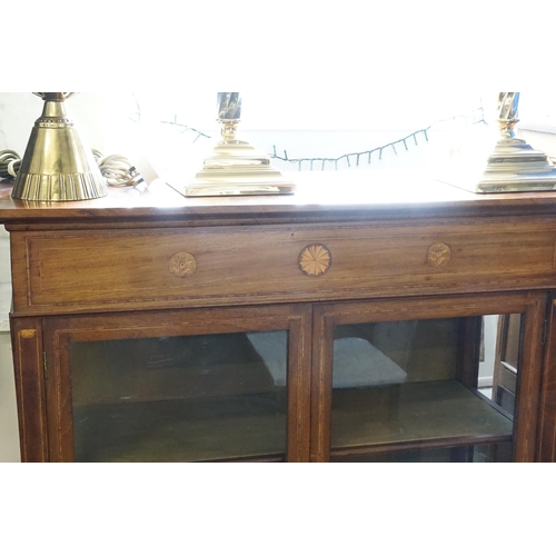 723 - An Edwardian Mahogany Satinwood inlaid Display Cabinet with Shell inlay, Glass panelled Sides & rest... 