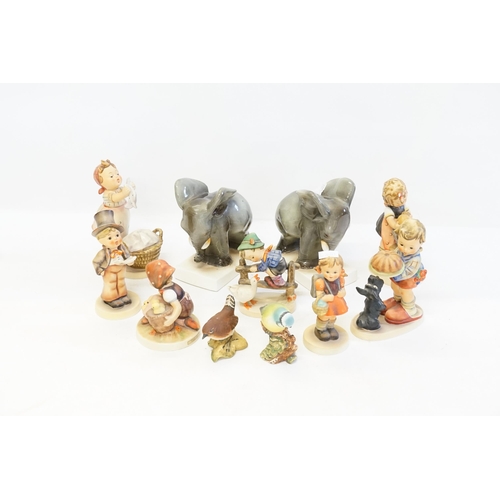 1098 - A Collection of 7 Hummel Figurines, a Pair of Elephant Book Ends & two Beswick Birds.