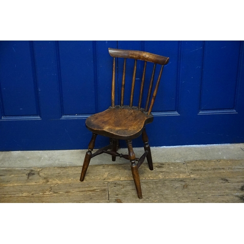 725 - A Victorian Beech Framed Stick Back Child's Chair on turned Legs.