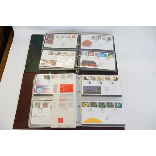 914 - Two Albums of First Day Covers to include Channel Tunnel, D-Day, Orchids, European Market, etc. Need... 