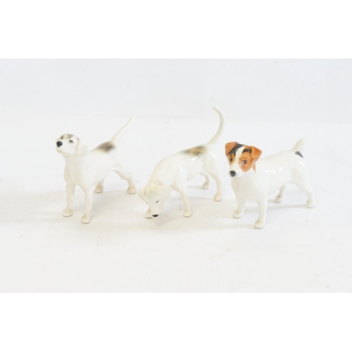 1056 - Three Various Beswick Fox Hounds in Cream.