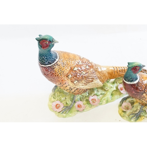 1061 - Three various Beswick Studies of Pheasants on flower encrusted Bases. Model No: 1225/1226 x2. Patent... 