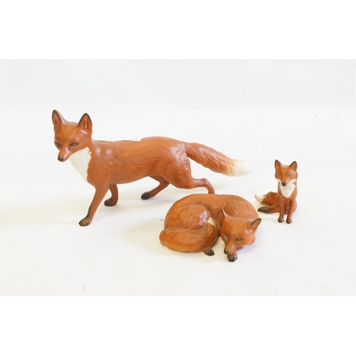 1083 - Three Various Beswick Studies of Foxes in a Tan Finish.