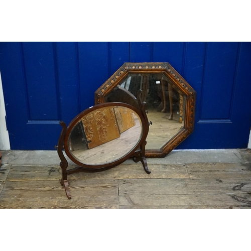 728 - A Swing Framed Toilet Mirror & a Hexagonal Carved Hall Mirror.