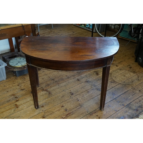 702 - A Georgian Mahogany DN Section Side Table resting on square legs. Measuring: 105cms across x 58cms d... 