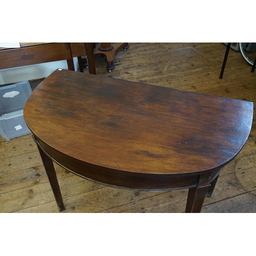 702 - A Georgian Mahogany DN Section Side Table resting on square legs. Measuring: 105cms across x 58cms d... 